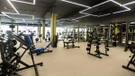 A typical local sized franchise open plan gym floor with various equipment